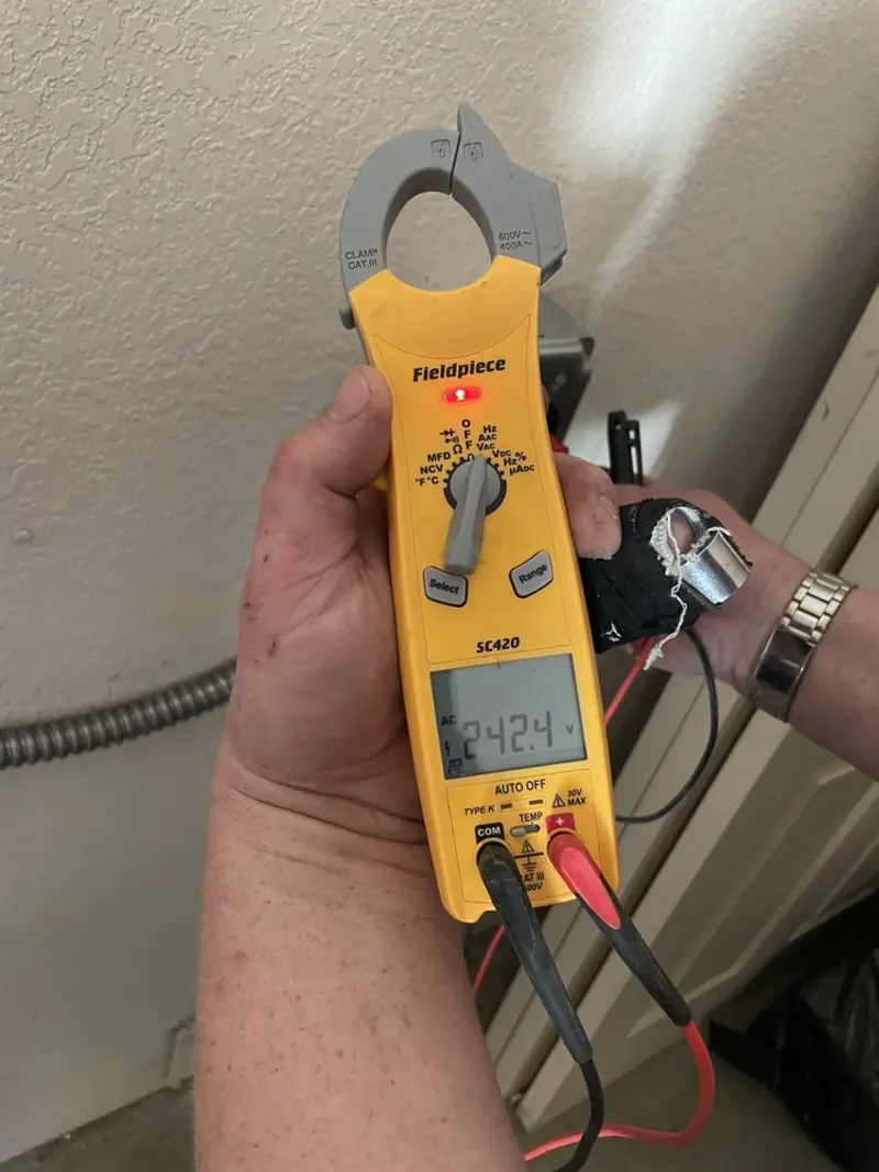 Voltage testing with clamp meter during Circuit Breaker Repair in Lake Worth